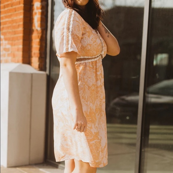 The Kenley detail empire waist in peach. - Picture 3 of 5